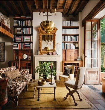 A warm, book-lined sitting room
